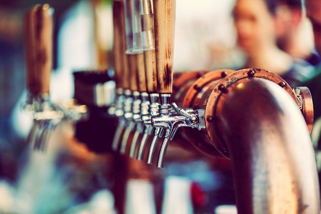 Beer tapping into a plastic cup Bar - Maroochydore